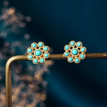 Antigua de oro artesanal con incrustaciones de turquesa pendientes para las mujeres Clásicas flores de color azul Oído Tacos estilo simple luz de lujo diaria de la joyería