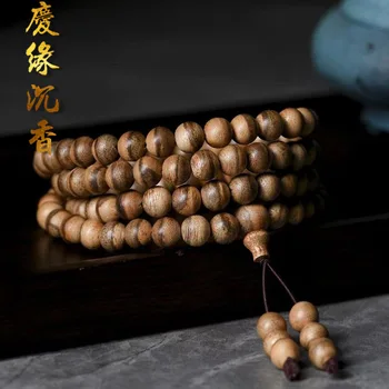 Envío gratis estilo Chino aloes de la mano de la cadena de Brunei 108 cuentas del rosario de la leche de la fragancia de madera de agar de material viejo Buda pulsera de perlas